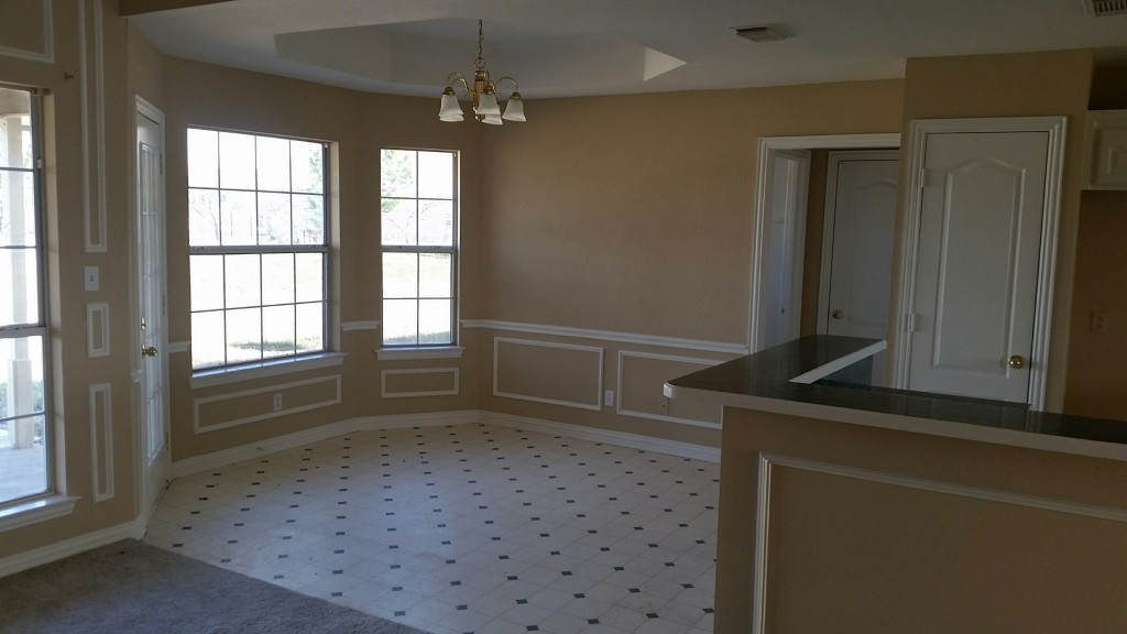 Dining area between kitchen and living